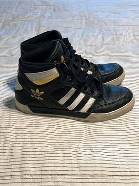 adidas Black and White High-Top Sneakers with Gold Accents